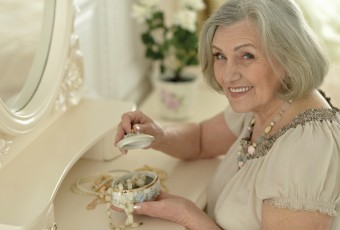 happy Senior woman portrait with jewelry box